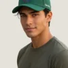 Gorra ñanduti hombre color verde